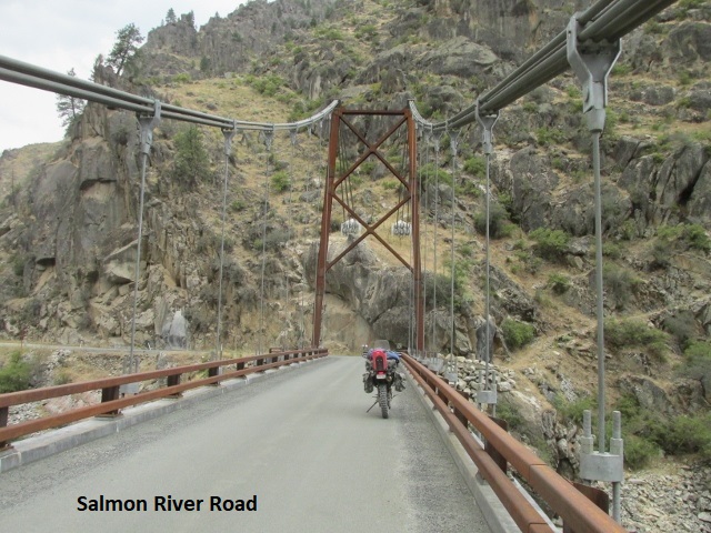 A person riding a motorcycle on a bridge

Description automatically generated with medium confidence