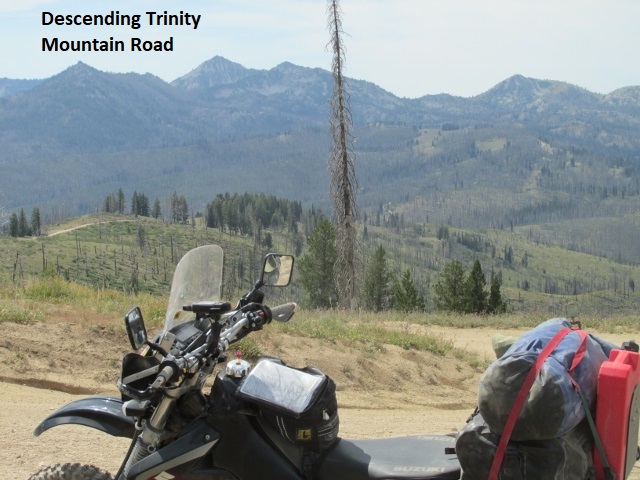 A picture containing mountain, outdoor, motorcycle, grass

Description automatically generated